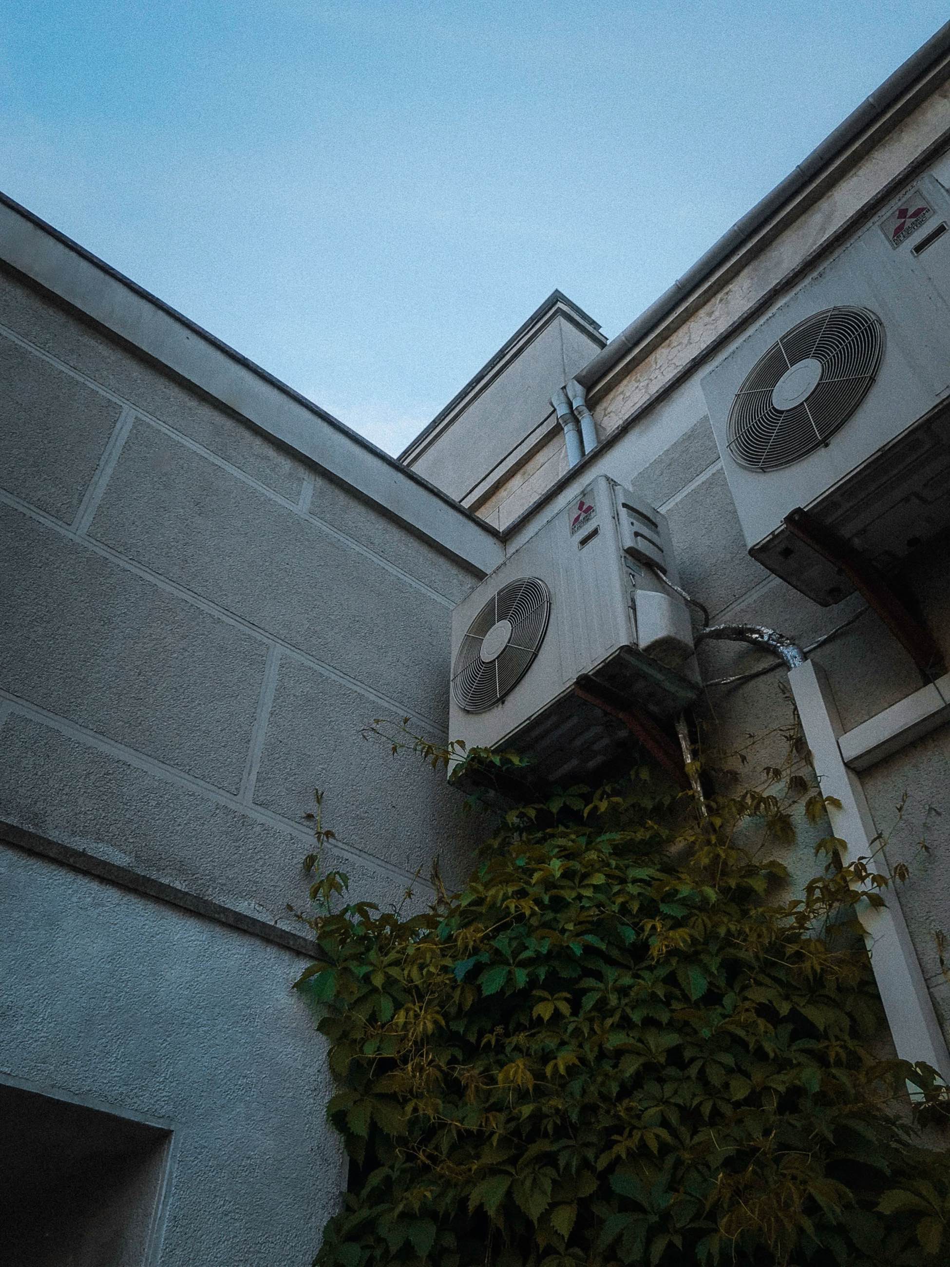 Outdoor air-conditioning units mounted on a modern exterior wall